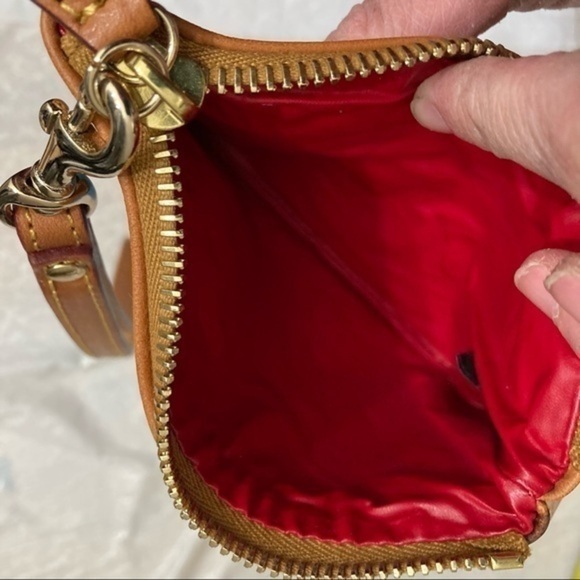 Dooney and Bourke blue leather wristlet bag